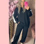 JOGGING SET ZWART MET WITTE BIES