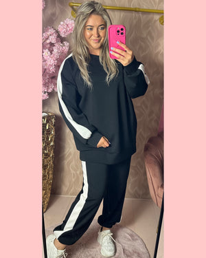 JOGGING SET ZWART MET WITTE BIES
